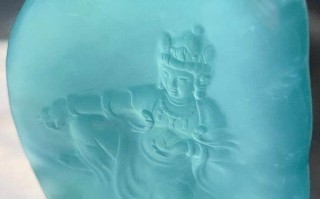 请问下面的翡翠观音牌（周旺作品）是什么种色？大约价位是多少？