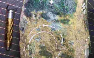 翡翠原石鉴定机构电话,翡翠原石鉴定机构