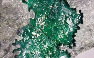 莫湾基黑腊皮壳原石癣莫湾基翡翠原石腊皮壳特征