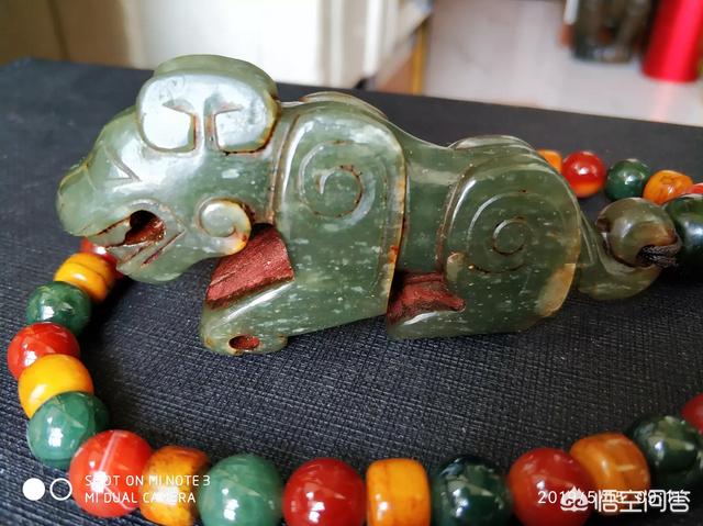 何为古玉中的“周青.战国青”?请举例说明?-第2张图片-翡翠网 何为古玉中的“周青.战国青”?请举例说明?-第2张图片-翡翠网