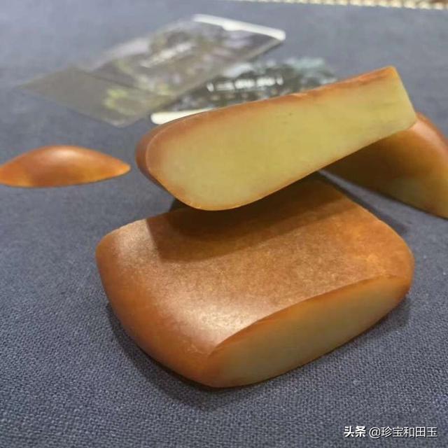为什么新疆和田玉素有“一红二黄三墨四羊脂”的说法？-第5张图片-翡翠网