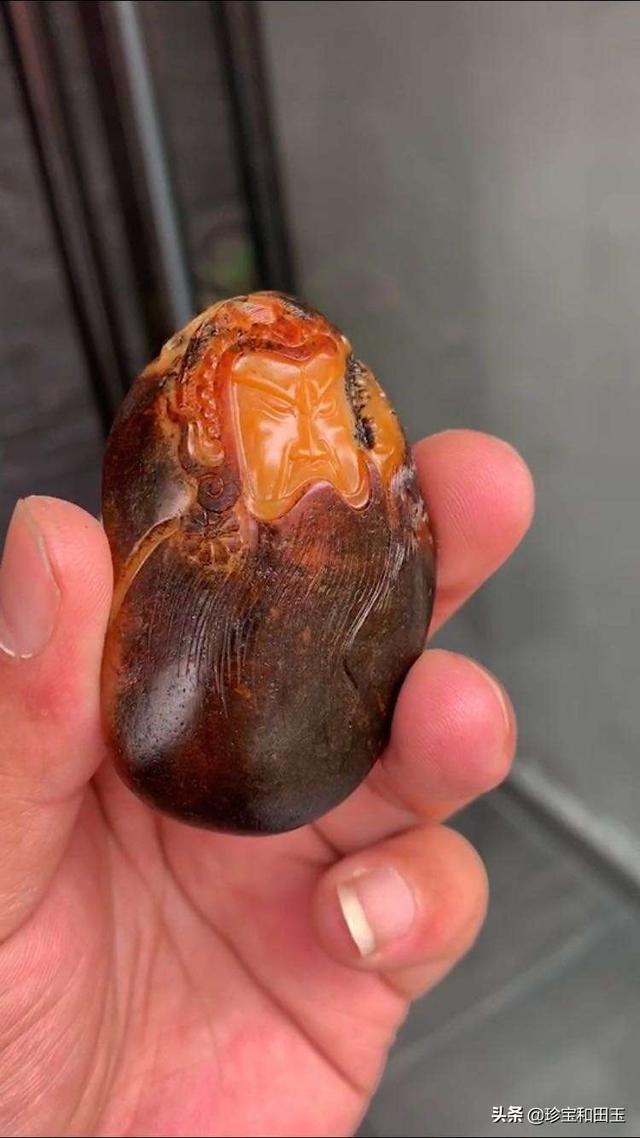 为什么新疆和田玉素有“一红二黄三墨四羊脂”的说法？-第1张图片-翡翠网