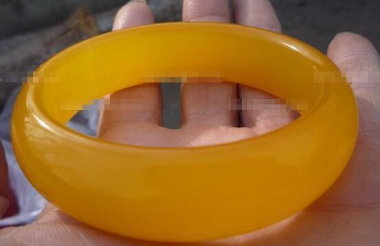 怎么鉴定黄龙玉真假好坏?-第1张图片-翡翠网 怎么鉴定黄龙玉真假好坏?-第1张图片-翡翠网