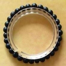 图解黑曜石、黑玛瑙、黑碧玺、墨翠、墨玉、砭石等宝石种类-第4张图片-翡翠网