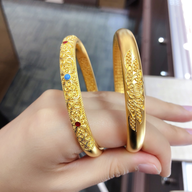 金镯子的寓意和象征,金镯子的寓意和象征风水-第1张图片-翡翠网 金镯子的寓意和象征,金镯子的寓意和象征风水-第1张图片-翡翠网