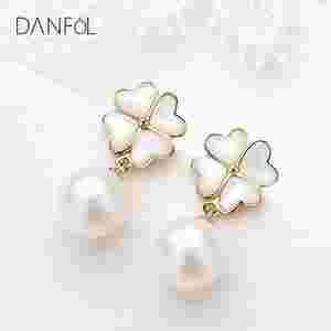 四叶草耳钉金色好看还是银色好看四叶草金耳环-第1张图片-翡翠网