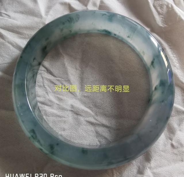 翡翠手镯常见裂痕图片,翡翠手镯生长纹图片-第5张图片-翡翠网 翡翠手镯常见裂痕图片,翡翠手镯生长纹图片-第5张图片-翡翠网