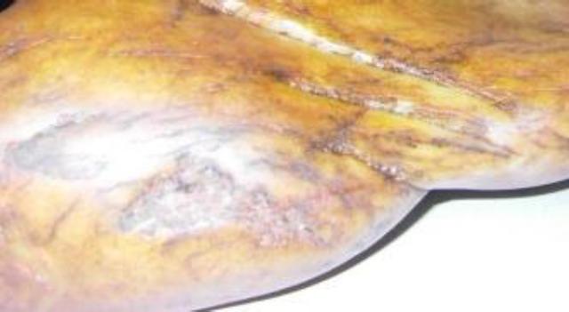 锅不粘水是什么原因翡翠原石不沾水是什么原因-第8张图片-翡翠网