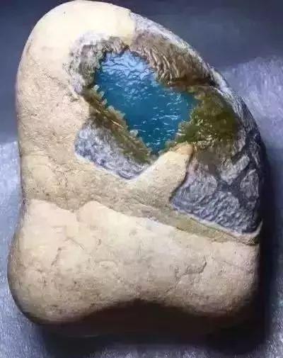莫西沙玻璃种原石,莫西沙冰蓝翡翠原石视频-第20张图片-翡翠网