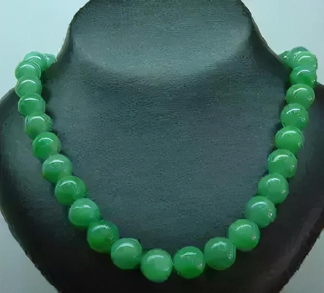 豆种翡翠原石图片,木纳种翡翠是什么档次-第12张图片-翡翠网 豆种翡翠原石图片,木纳种翡翠是什么档次-第12张图片-翡翠网