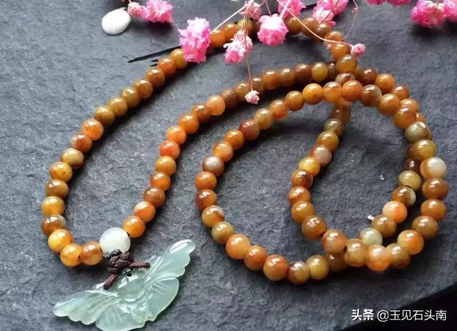 翡翠原石压灯黄雾鸡蛋黄翡翠原石价格-第1张图片-翡翠网 翡翠原石压灯黄雾鸡蛋黄翡翠原石价格-第1张图片-翡翠网