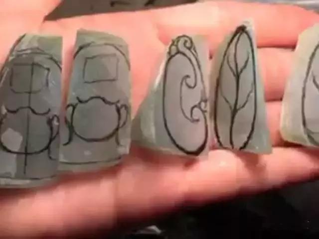 翡翠原石的价位黑色冰种翡翠原石-第7张图片-翡翠网 翡翠原石的价位黑色冰种翡翠原石-第7张图片-翡翠网