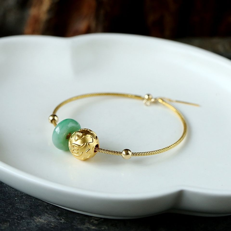 翡翠手镯和金手镯,翡翠千足金手镯-第1张图片-翡翠网 翡翠手镯和金手镯,翡翠千足金手镯-第1张图片-翡翠网