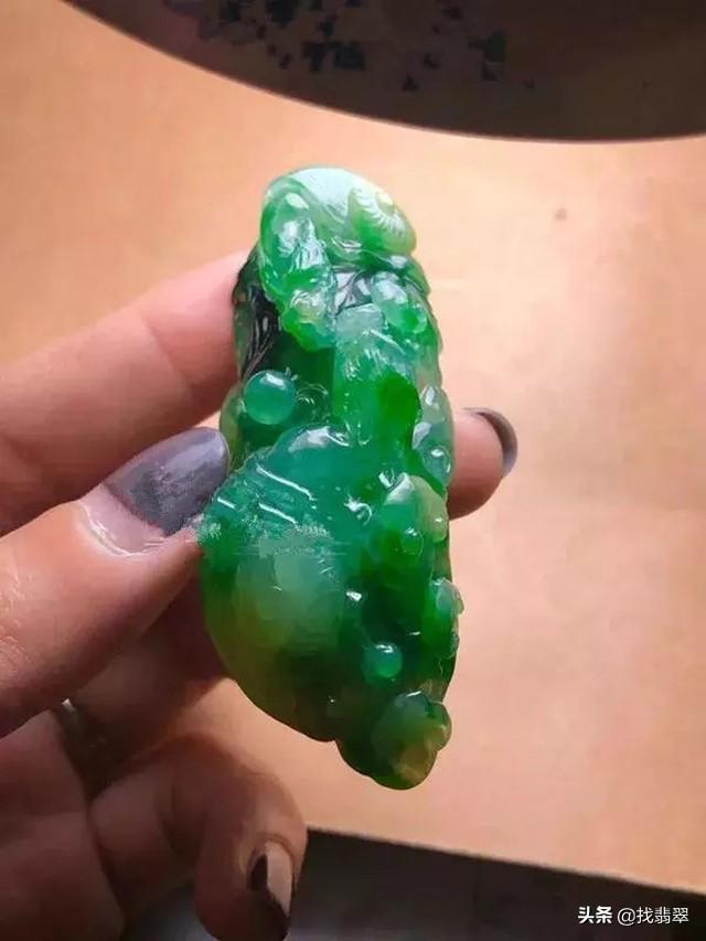 关于翡翠原石双龙戏珠的信息-第11张图片-翡翠网 关于翡翠原石双龙戏珠的信息-第11张图片-翡翠网
