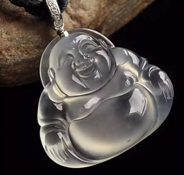 脱沙皮翡翠原石,翡翠原石上的蟒带-第15张图片-翡翠网 脱沙皮翡翠原石,翡翠原石上的蟒带-第15张图片-翡翠网