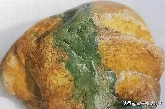 翡翠原石的种蟒和色蟒,翡翠原石黑色变白蟒-第4张图片-翡翠网