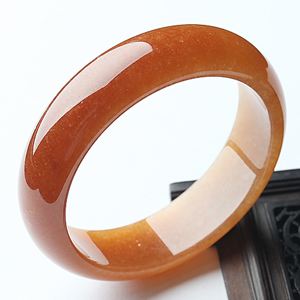 翡翠原石打灯起黄出什么料蜜糖色黄翡翠原石视频-第2张图片-翡翠网 翡翠原石打灯起黄出什么料蜜糖色黄翡翠原石视频-第2张图片-翡翠网